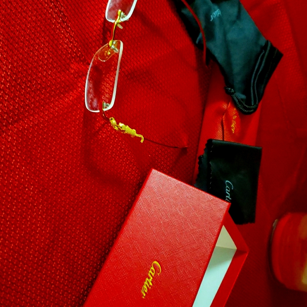 Gold leopard Cartier glasses